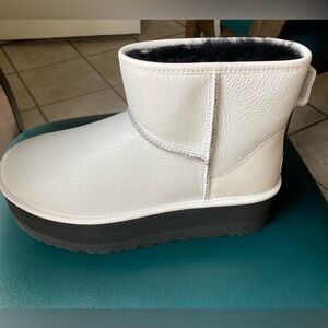 New and never worn white leather platform uggs